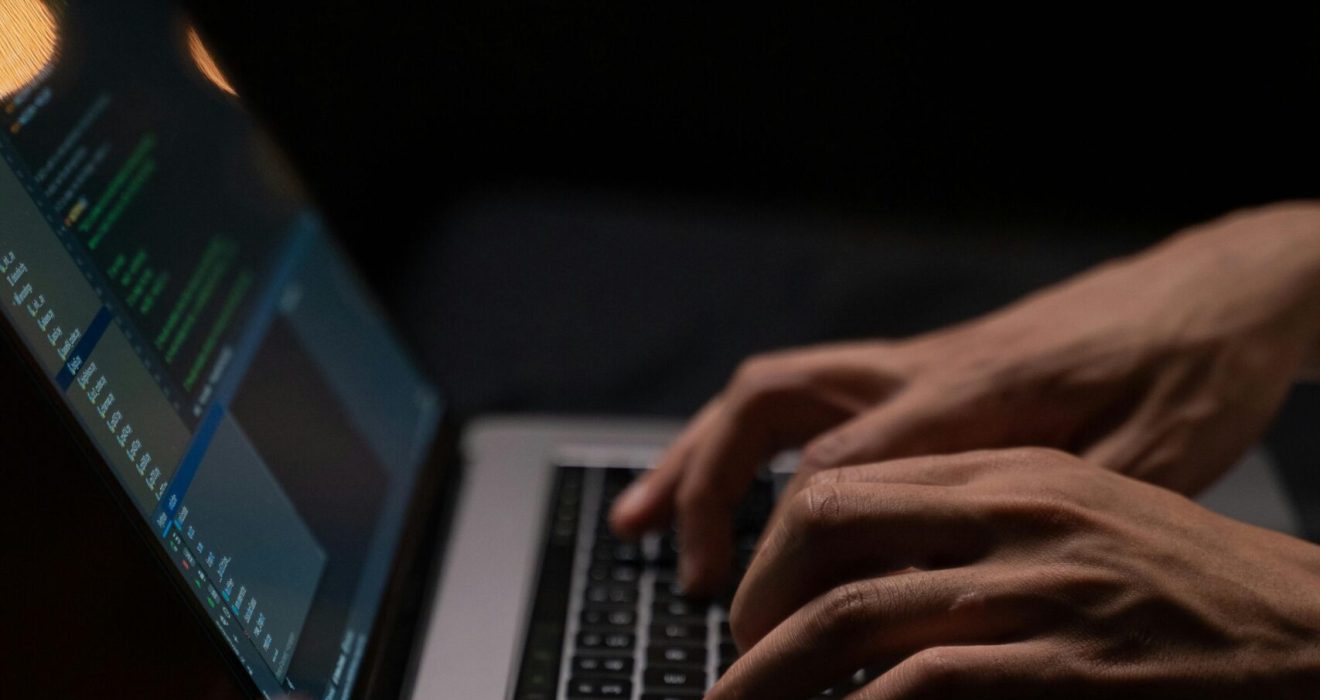 person-using-silver-and-black-laptop-computer